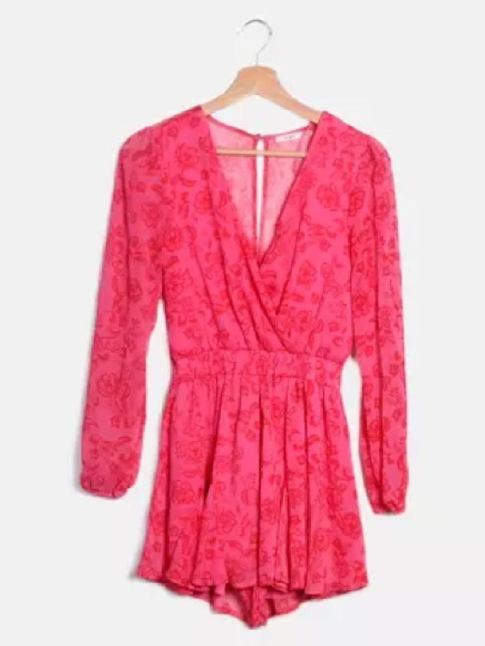 Francesca’s Mi Ami Bright Pink Floral Wrap Romper
